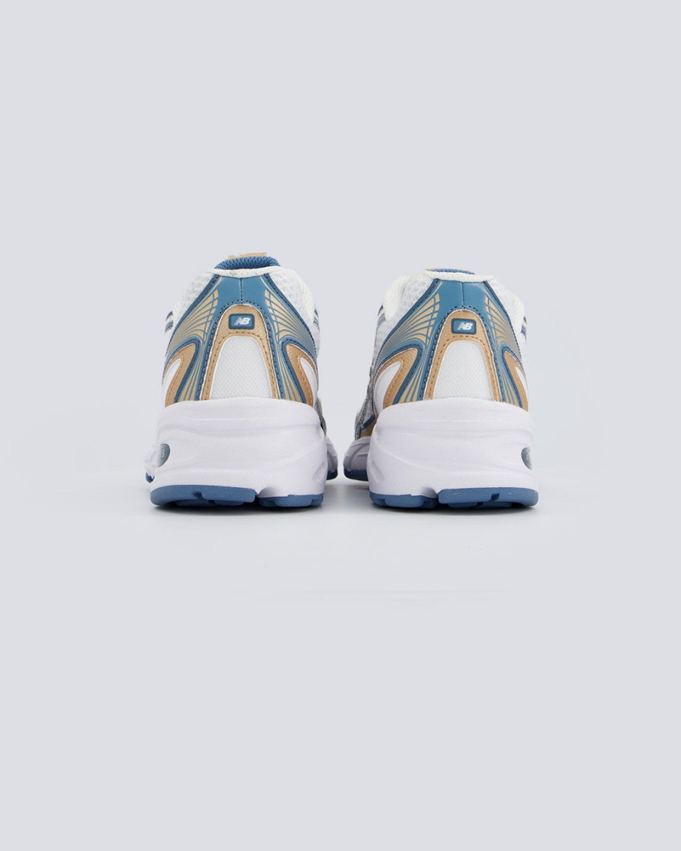 New Balance 740 Azul y Dorado Mujer