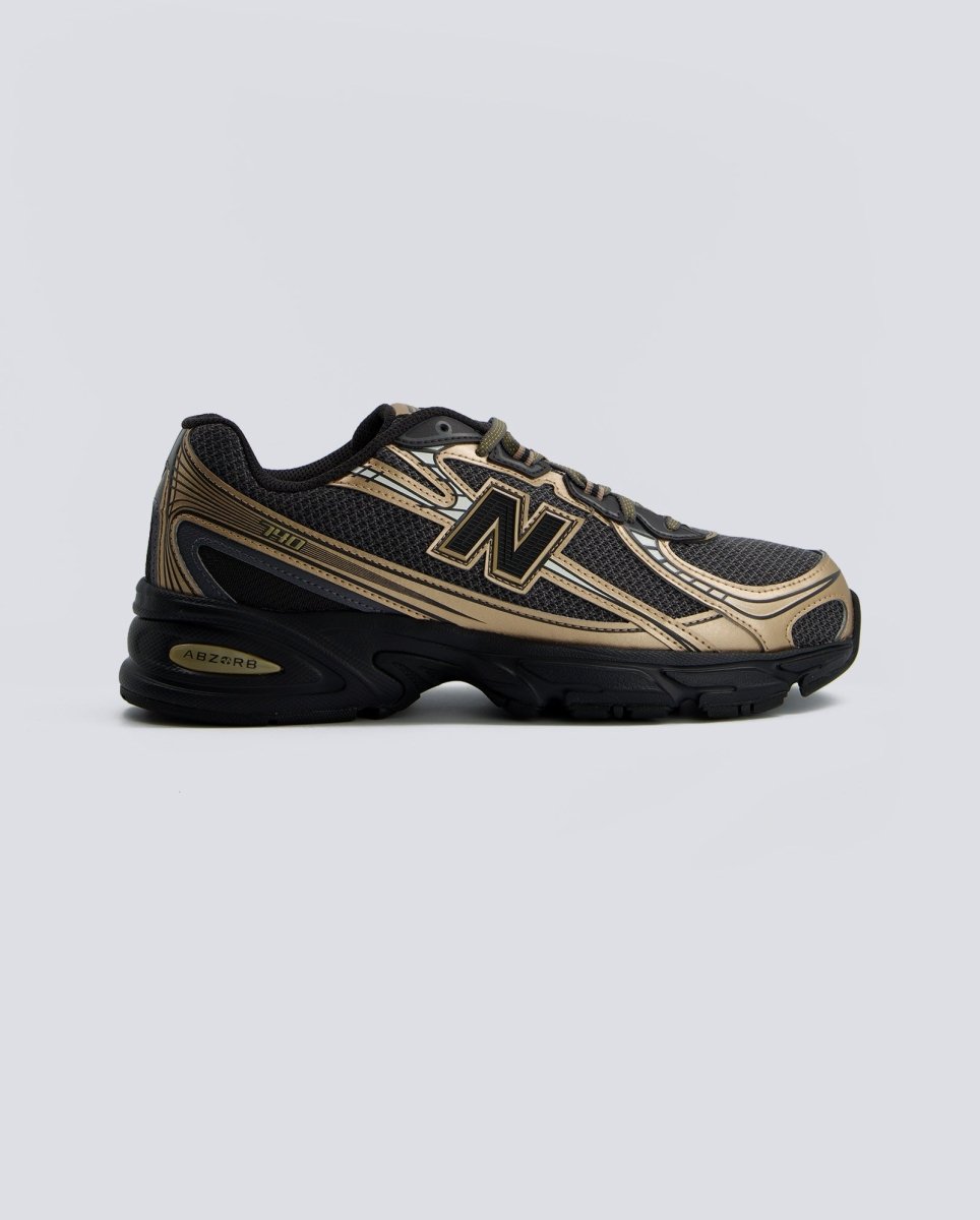 New Balance 740 Gris y Dorado Hombre