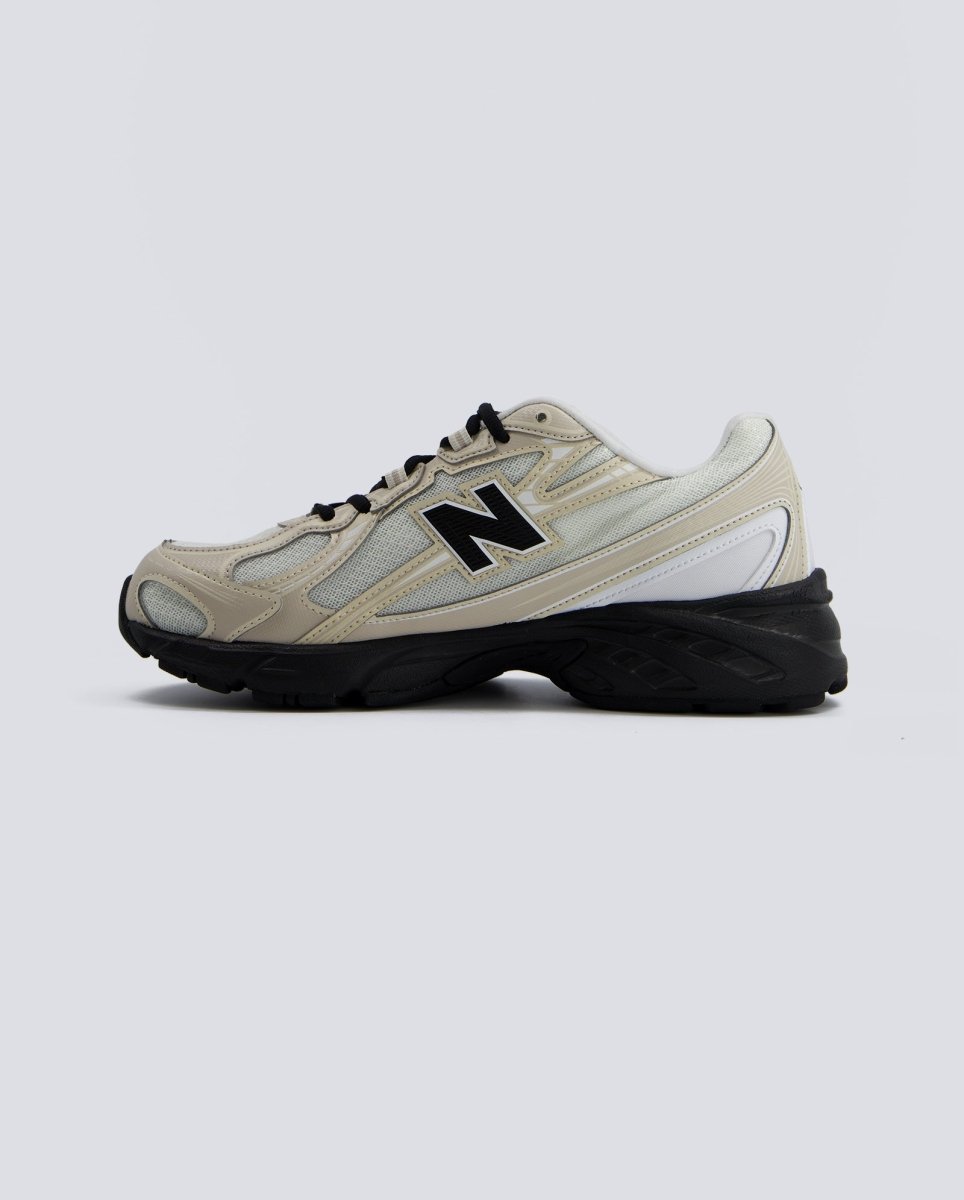 New Balance U7404OO Beiges y Negras Hombre