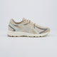 Asics Jog 100S Crema Mujer