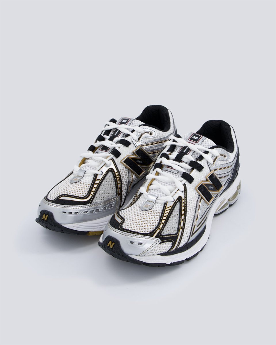 New Balance M1906Ra Lineas Doradas Hombre