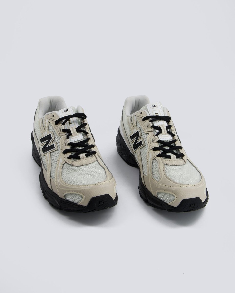 New Balance U7404OO Beiges y Negras Hombre
