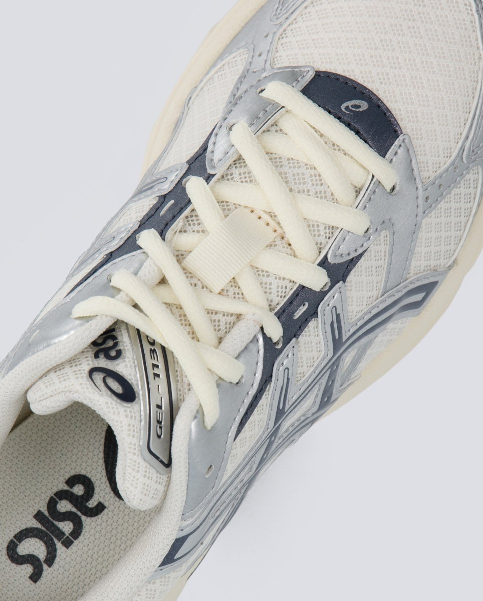 Asics GEL-1130 Plata y Rojo Mujer 1203A899-101
