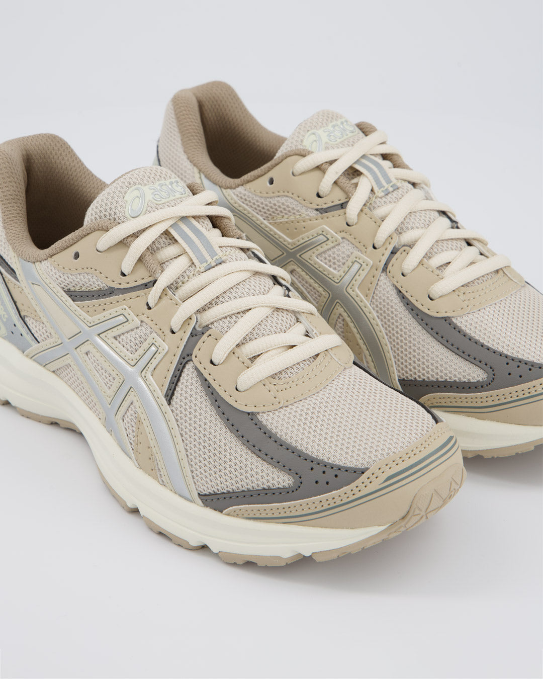 Asics Jog 100S Crema Mujer zapatillas